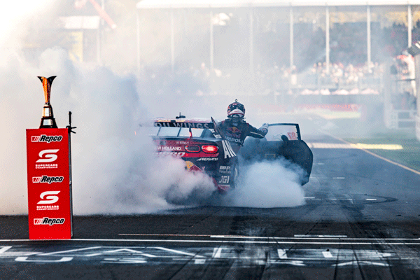 Will Brown drifting in his car.